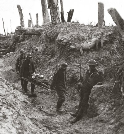 German prisoners, compelled to carry our wounded during the strenuous assault on Trones Wood, 1916 by English Photographer